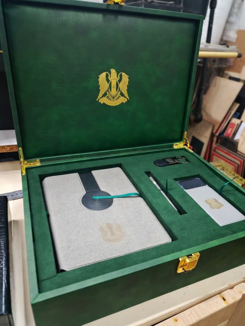 Green leather corporate gift set box with notebook and pen