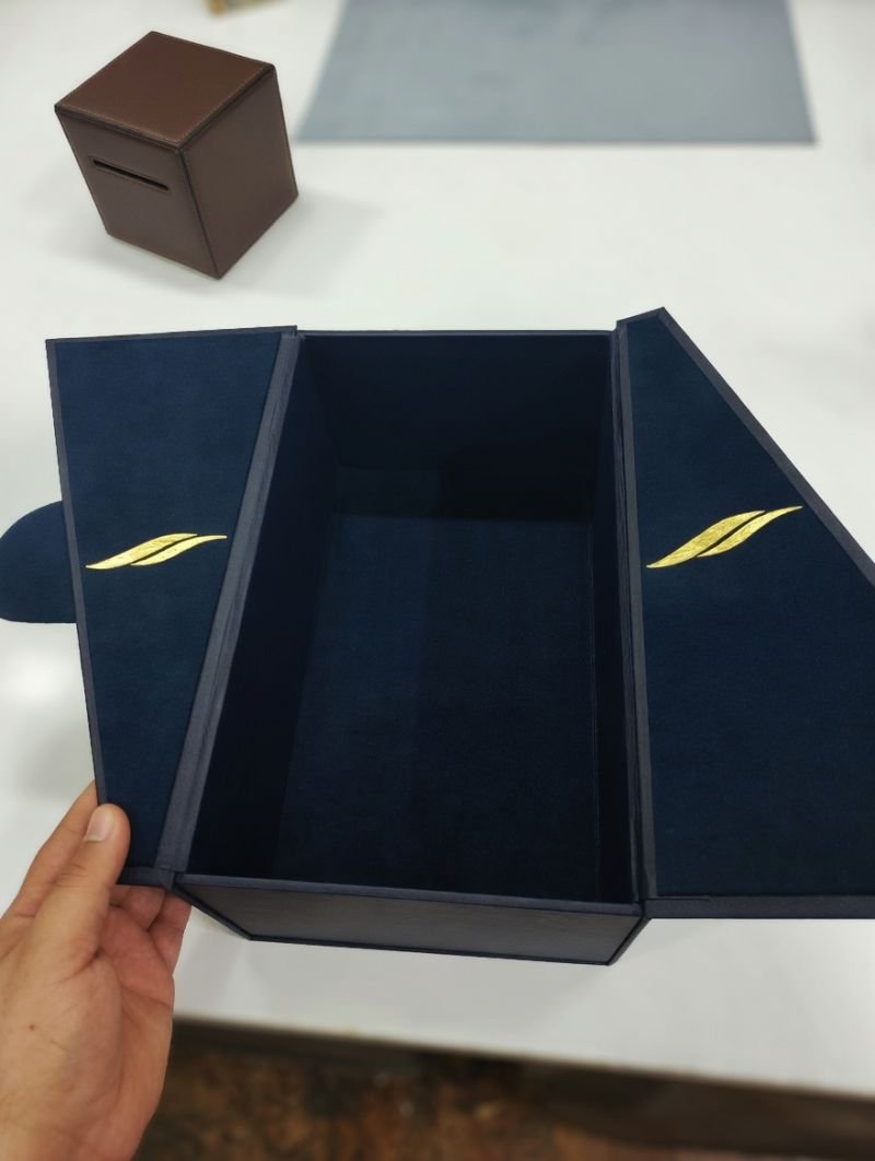 Hinged navy leather presentation box