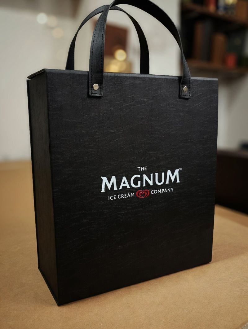Magnum branded black leather corporate carrier bag